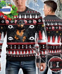 rottweiler baby in pocket ugly christmas sweater 3 ovf3e